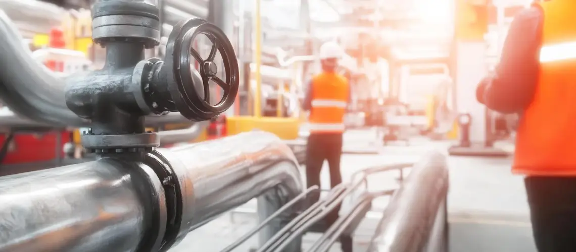 Professional valuer inspecting industrial machinery in Victoria